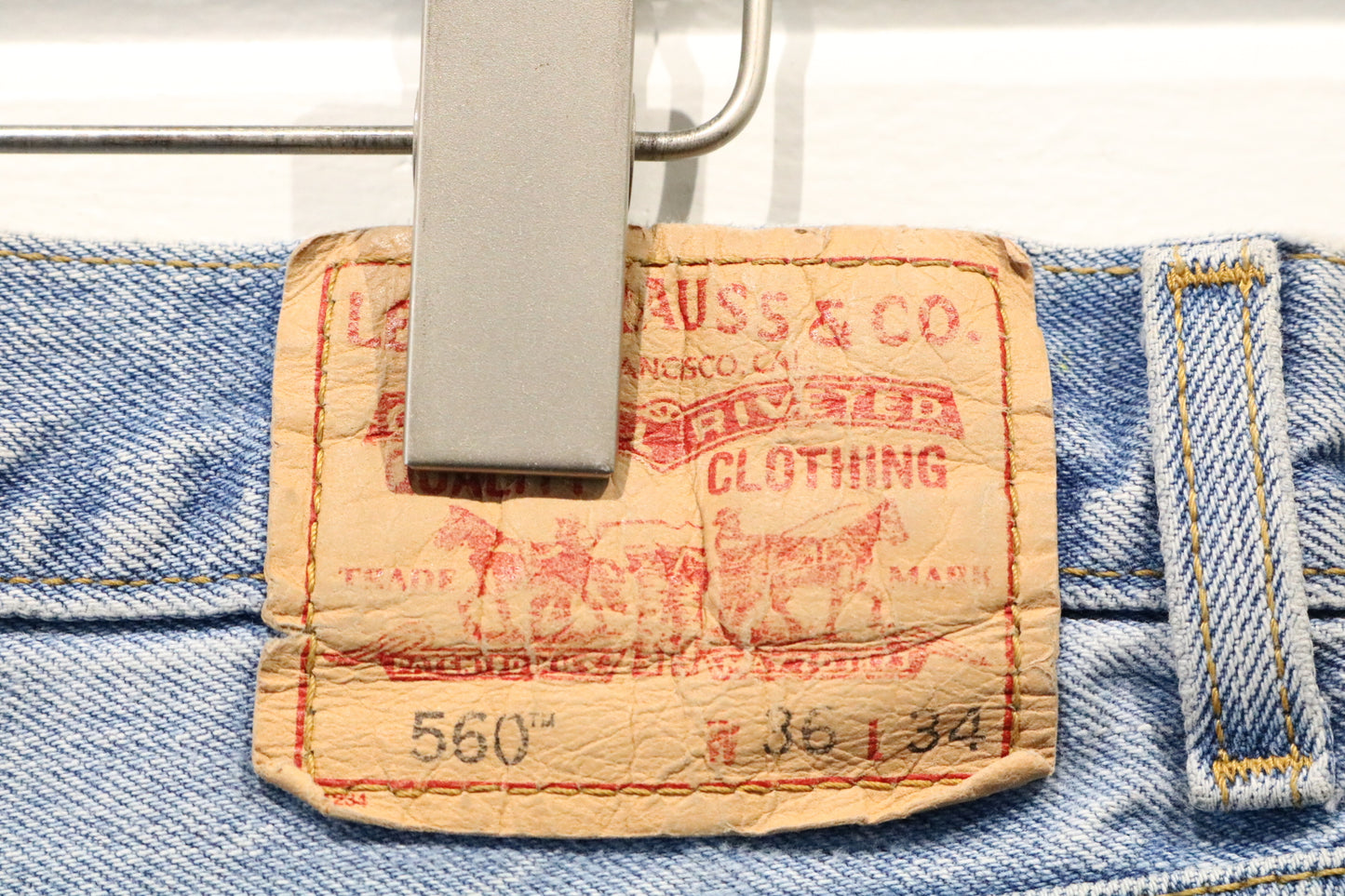 Levi's 560 Comfort-Fit Jeans | Vintage 90s Light Wash Denim with Neon Accents | Distressed Hem Urban Streetwear