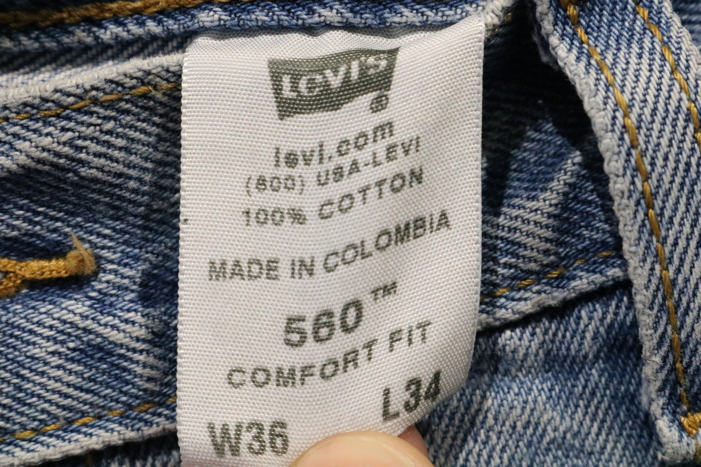 Levi's 560 Comfort-Fit Jeans | Vintage 90s Light Wash Denim with Neon Accents | Distressed Hem Urban Streetwear