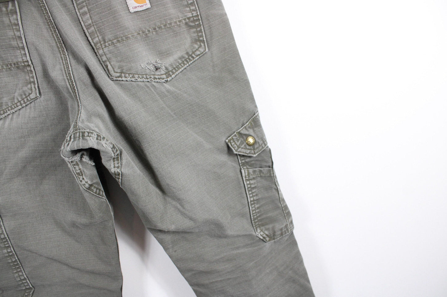 Carpenter pants / vintage carhartt construction workwear studio cargo utility trousers / 90s streetwear jeans / 32x30