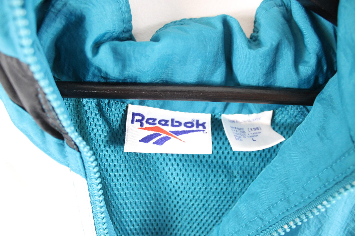 Vintage 1990s reebok teal windbreaker / quarter zip-up shell jacket / 90s hip hop clothing / streetwear / athletic wear