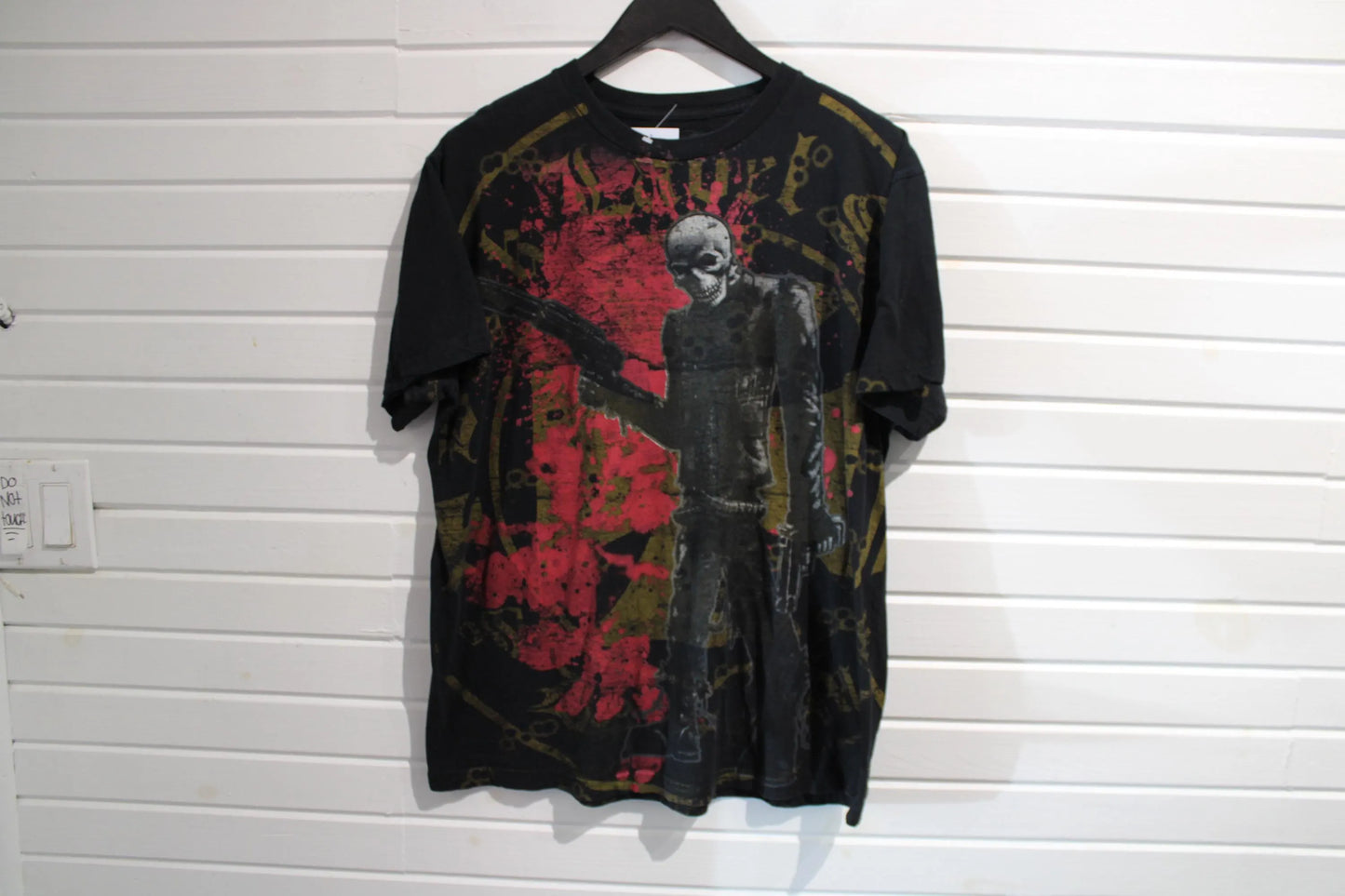 Rock-&-Rebellion Skull Graphic T-Shirt | Vintage 2000s Distressed All Over Print Tee | Bold Gothic Streetwear