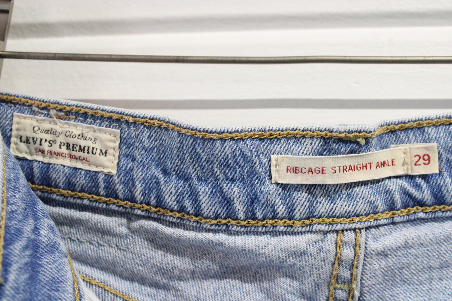 Levi's Ribcage Straight Ankle Jeans | Vintage Light Wash Distressed Denim Pants | Classic Button-Fly Denim Trousers