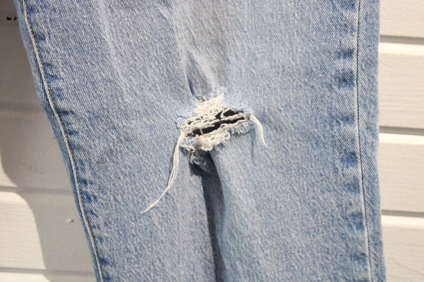 Levi's Ribcage Straight Ankle Jeans | Vintage Light Wash Distressed Denim Pants | Classic Button-Fly Denim Trousers